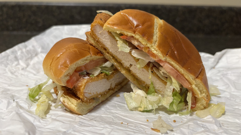 Wendy's Spicy Chicken Sandwich cut in half on wrapper