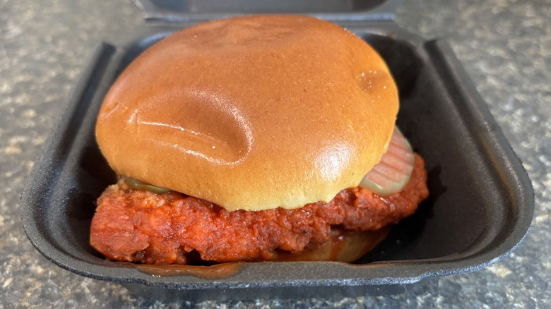 Wingstop Chicken Sandwich in hot sauce in takeout box
