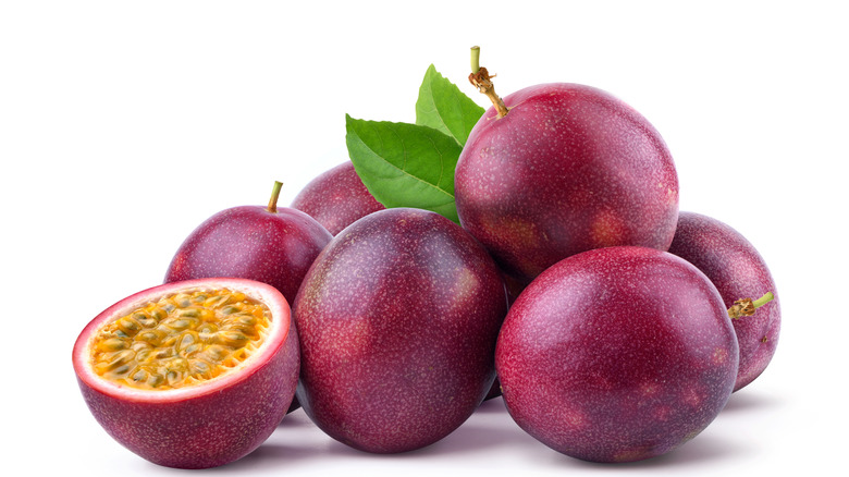 Passion fruit with cut in half isolated on white