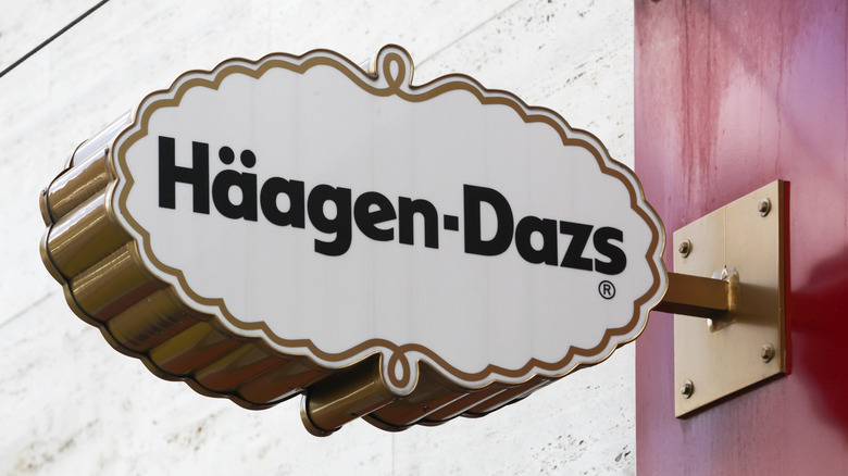 Häagen-Dazs sign attached to a wall.