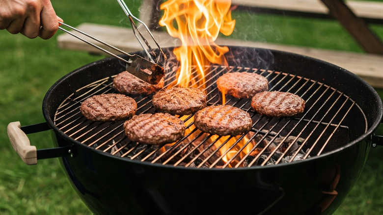 burgers on a charcoal grill