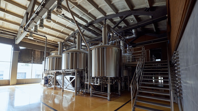 Brewery or distillery with large tanks