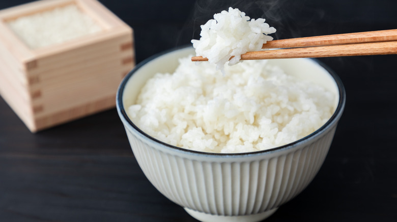 chopsticks grabbing rice