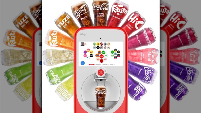 A Coca-Cola Freestyle Machine next to two tanks of water