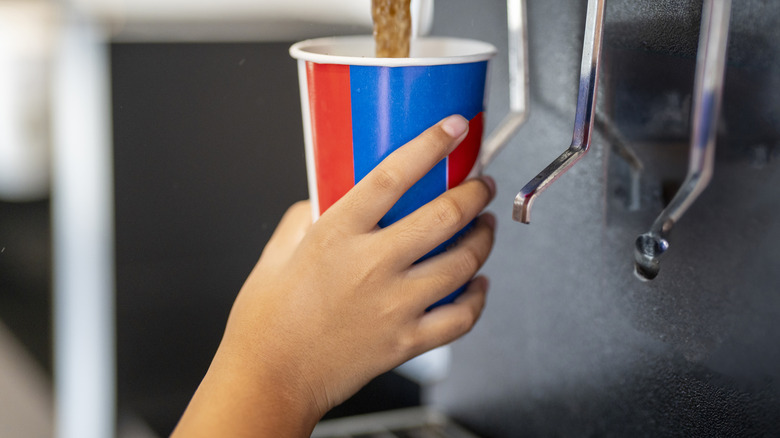 A Coca-Cola Freestyle Machine next to two Icee machines