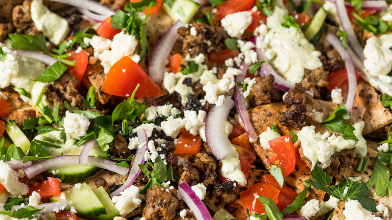 Chopped tomato, red onion, parsley, cucumber, feta and spiced meat