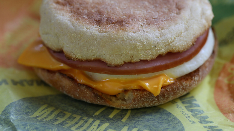 The egg McMuffin from McDonald's on top of its wrapping paper