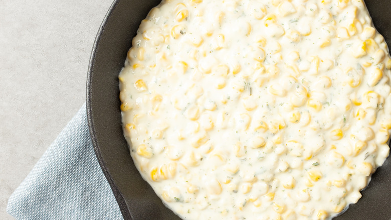 corn mayonnaise in a black bowl