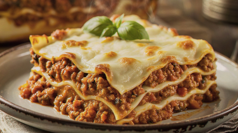 Large slice of lasagna with bechamel sauce
