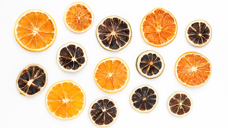 Various sizes of dried orange and lime slices