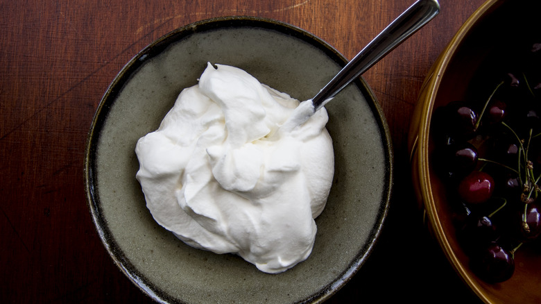 A small bowl of homemade whipped cream