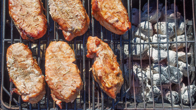 Pork chops cooking via indirect heat