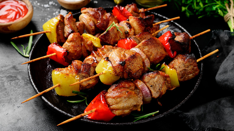 grilled meat kabobs with vegetables