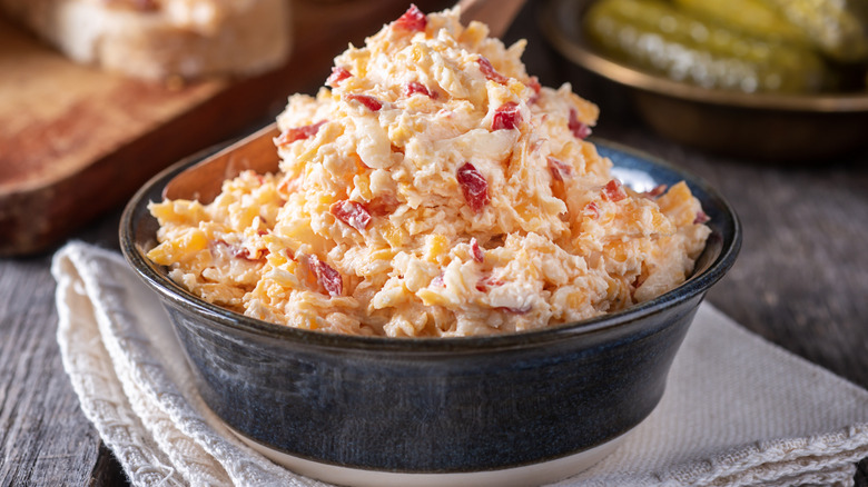 Small black bowl of pimento cheese