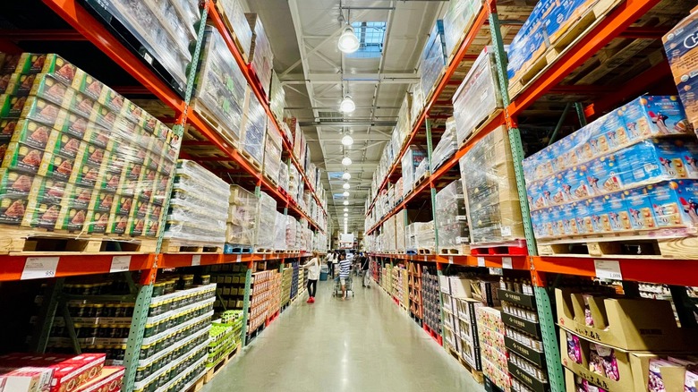 People shopping in aisle of Costco
