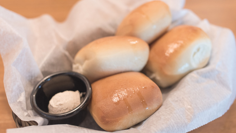 Close-up of a basket of Texas Roadhouse rolls