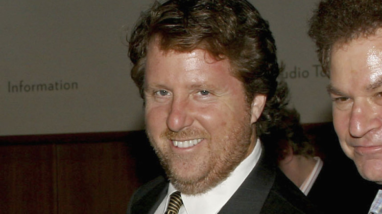 David Rosengarten smiling at camera in suit
