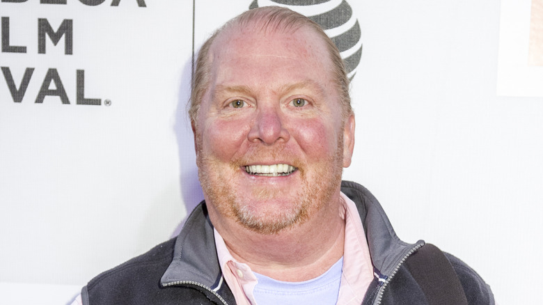 Mario Batali wide eyed and grinning widely