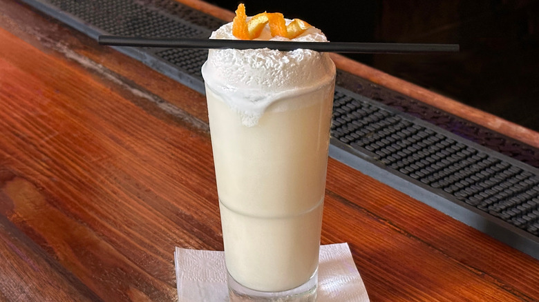 Ramos gin fizz on a bar counter