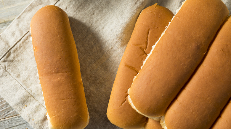 Hot dog buns on a cloth napkin