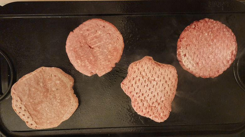 numerous frozen burger packages
