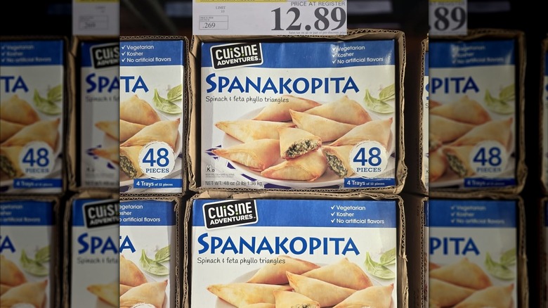 Boxes of Cuisine Adventures Spanakopita in Costco frozen foods aisle