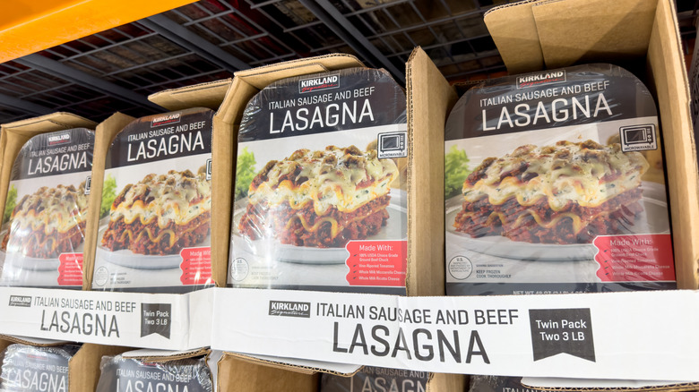 Kirkland Signature's Italian Sausage and Beef Lasagna in rows of packages in freezer at Costco