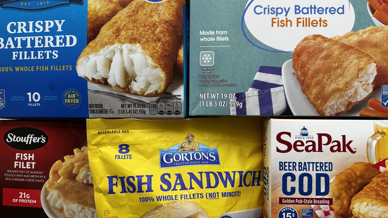 various boxes of frozen fish fillets
