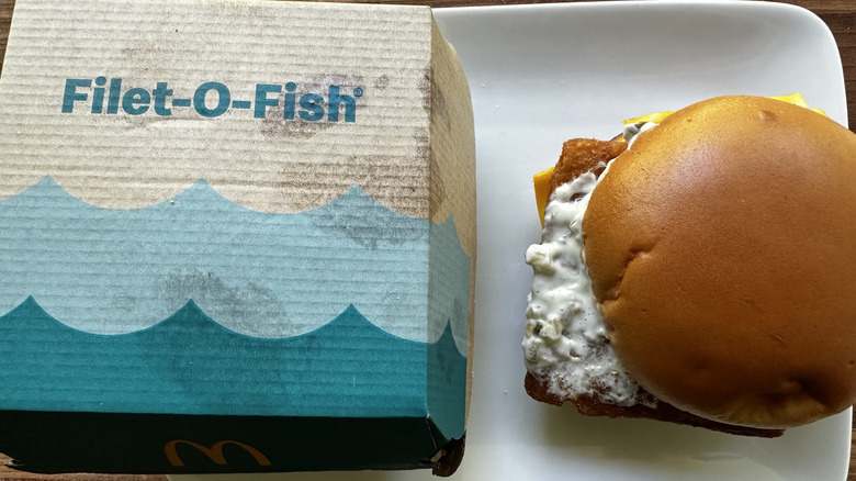 McDonald's Filet-O-Fish on plate next to box