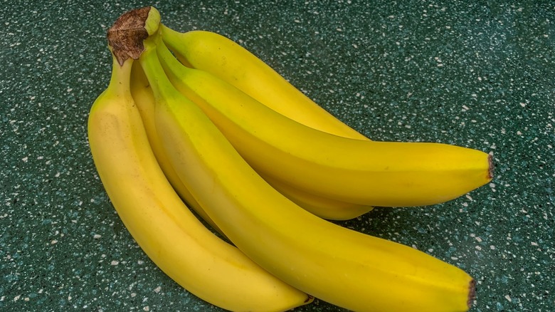 Bunch of bananas on kitchen counter