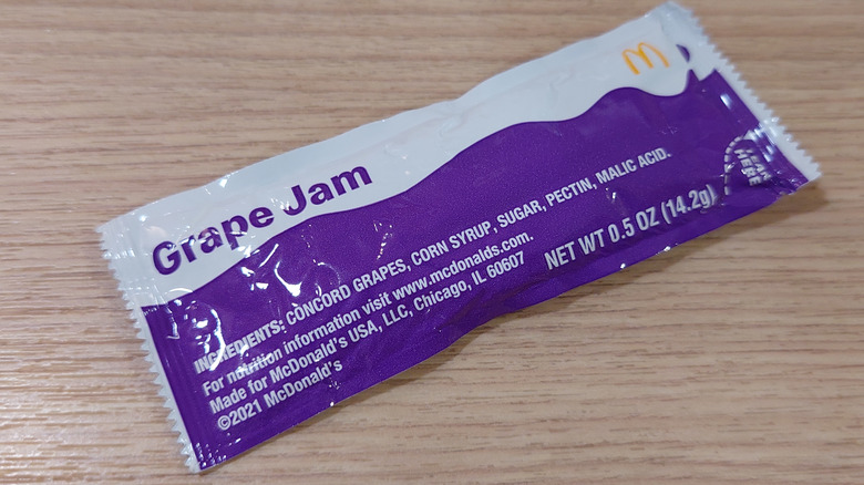 A packet of Grape Jam from McDonald's in purple