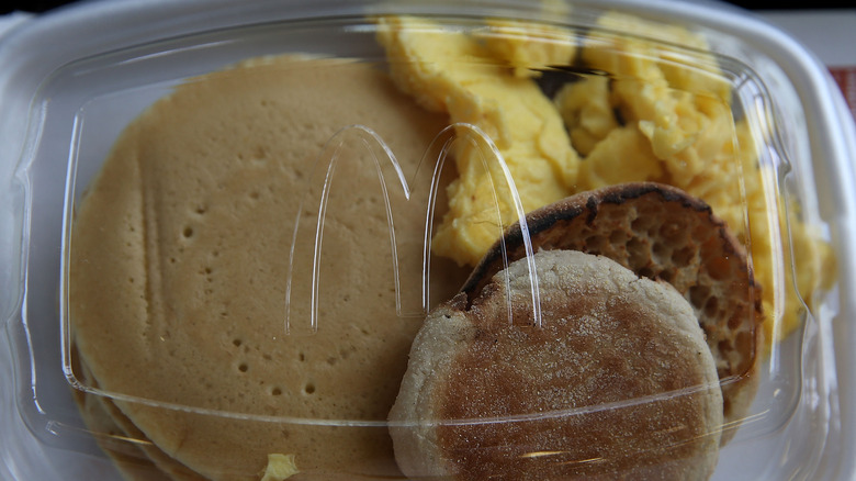 A McDonald's Big Breakfast with hotcakes, scrambled eggs, and an English muffin