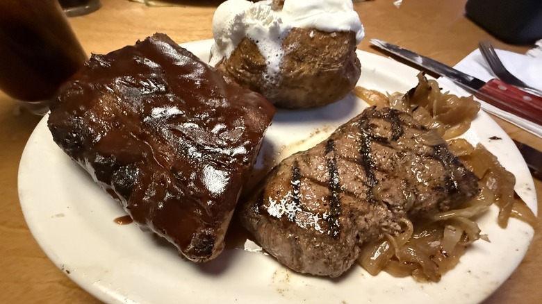 Plate of steak and ribs at Texas Roadhouse.
