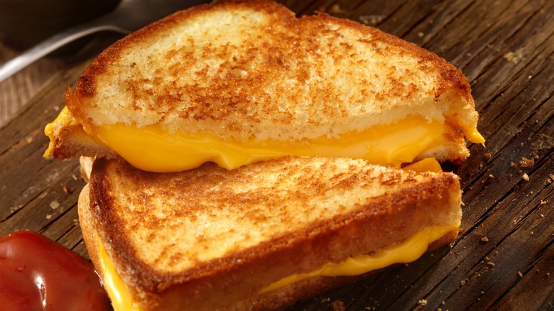 Grilled cheese sandwich with cheese oozing out