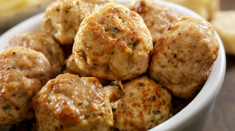 Close-up picture of meatballs in a white bowl
