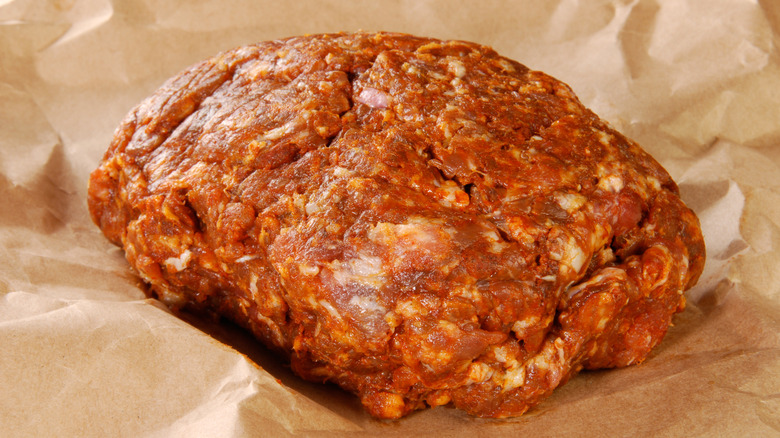 fresh ground chorizo on parchment paper