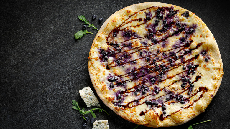 Blueberry pizza on a table