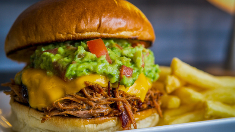 Pulled pork sandwich with cheese and guacamole