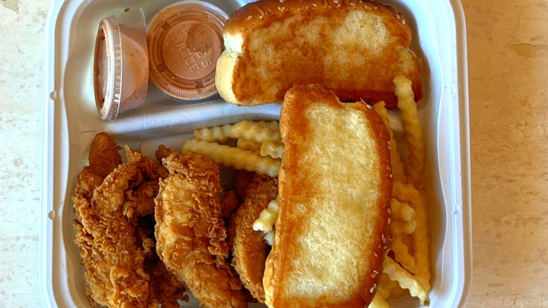 Raising Cane's meal in a plastic takeout container