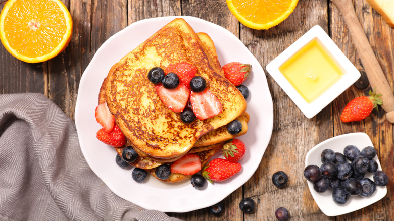 french toast with berries and oranges