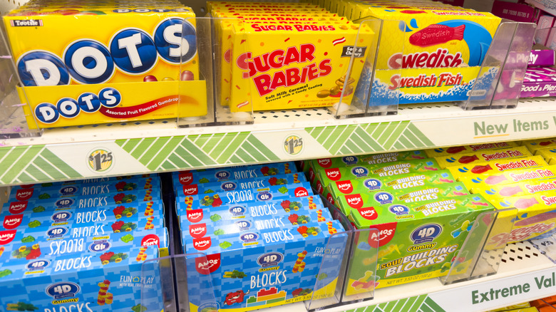 Rows of various candies in boxes