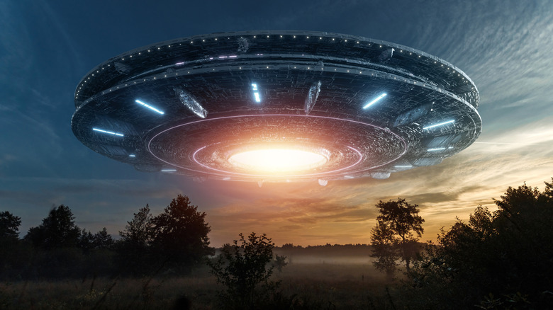 Flying saucer above a clearing