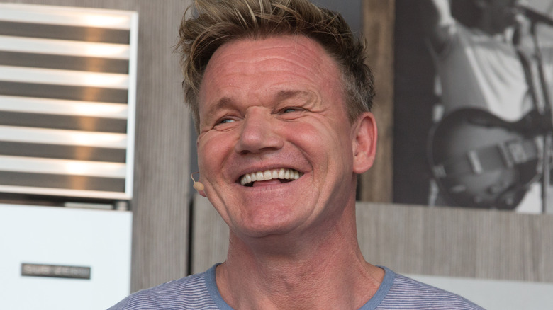 Gordon Ramsay smiling in a kitchen