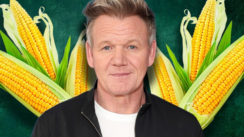 Chef Gordon Ramsay smiles with corn cobs behind