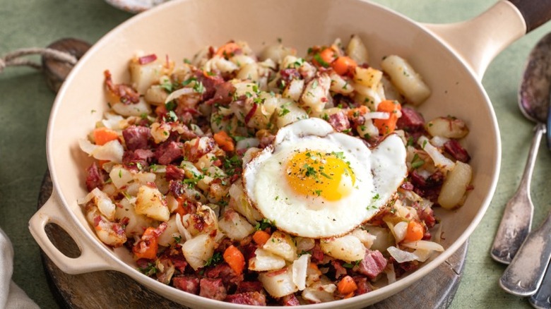 Corned beef hash with an egg on top.