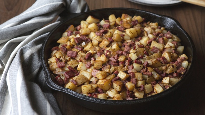 A skillet full of corned beef hash.