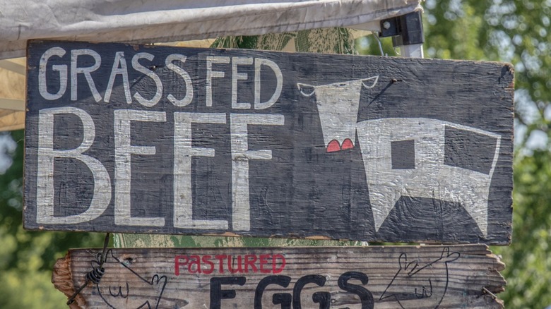 rustic-looking sign advertising grass-fed beef