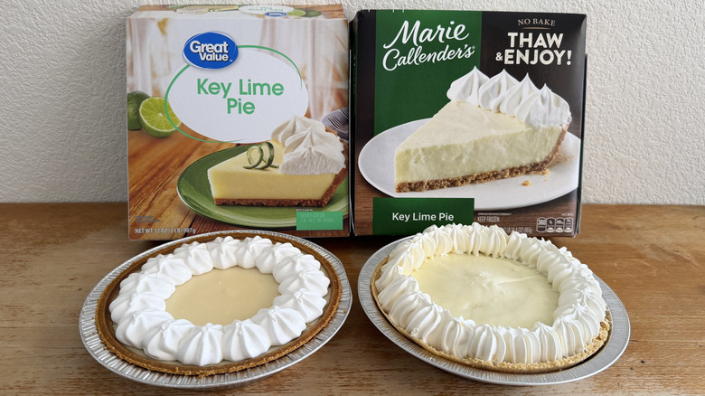 both full pies on a table, their boxes in background