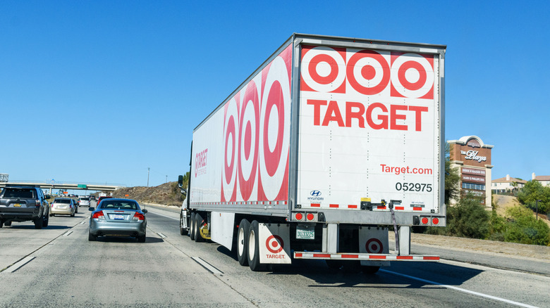 Back of Target semi on highway passing car