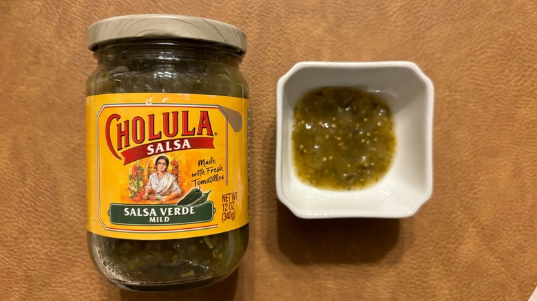 Cholula Mild Salsa Verde jar with salsa in white ramekin